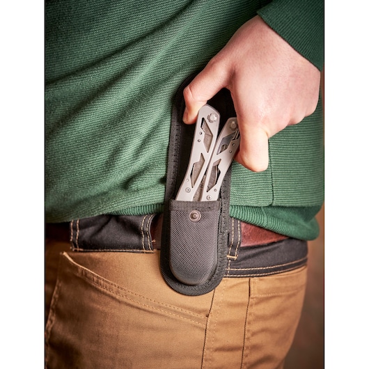 STANLEY 0-84-519 multitool in black belt pouch, close-up photography of product being accessed.