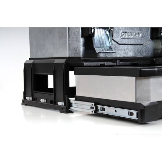 STANLEY 1-95-830 tool box close-up, showing metal drawer on sliding rails, black and silver finish, front angle.
