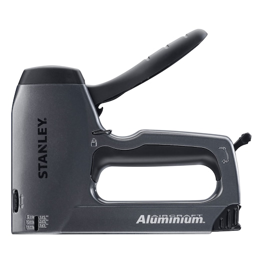 STANLEY 6-TR250 aluminum stapler side view on white background, ergonomic handle and staple size markings.