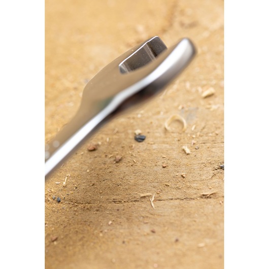 STANLEY FMMT82844-0 spanner close-up on wood surface, showing open end and polished finish.