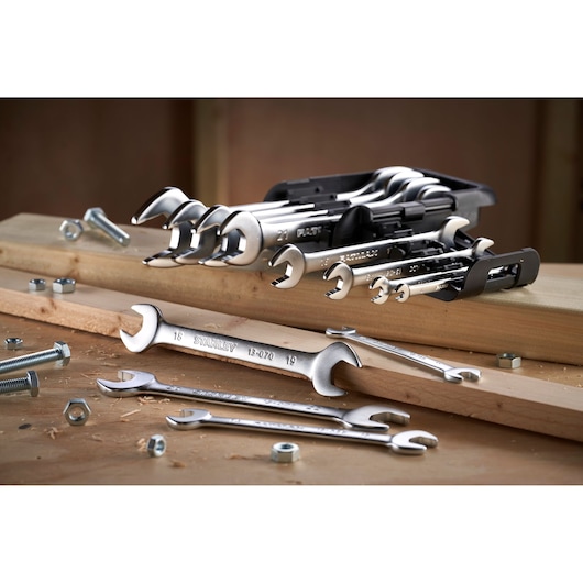 STANLEY FMMT82902-0 wrench set displayed on wood with bolts and nuts, workshop photography.