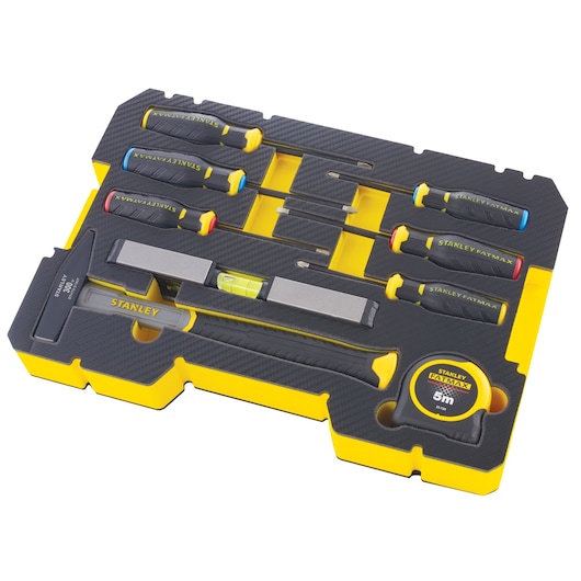Stanley FMMT98108-1 tool set with hammer, screwdrivers, level and tape measure, top view on white.
