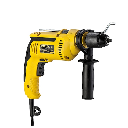 Photo of STANLEY SDH700 yellow corded drill with side handle, black accents, and visible control switch, side angle.