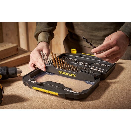 Photo of STANLEY STA7184 drill bit and accessory set in black case, tabletop angle.