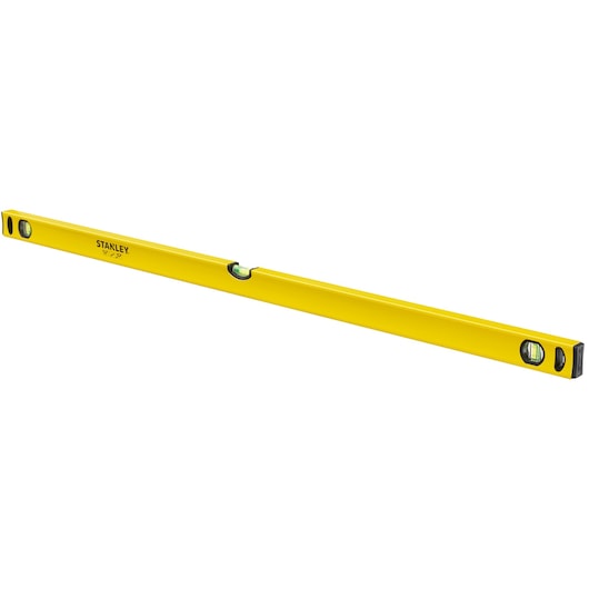 Stanley STHT1-43106 yellow spirit level, side angle photo, three vials visible in the tool body.