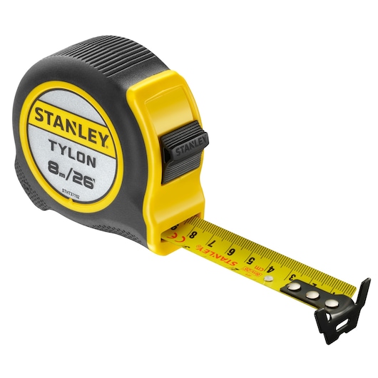 STANLEY STHT37192 tape measure, 8m/26ft, yellow and black casing, angled front view with extended tape.