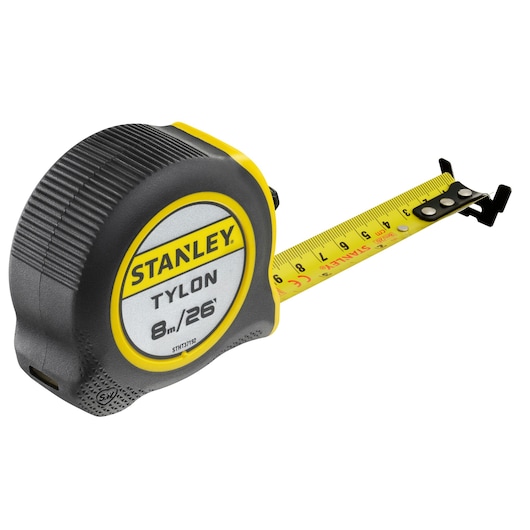 Photo of STANLEY STHT37192 tape measure, 8m/26ft length, black and yellow casing, angled on white background.