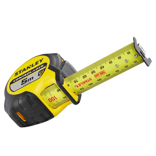 STANLEY STHT37239 tape measure, yellow and black, 5m, side angle on white background.