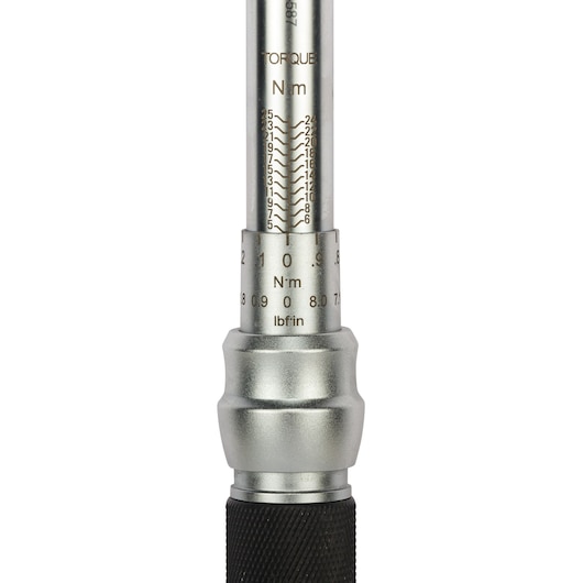 STANLEY STMT73587-8 torque wrench close-up, showing dual scale in Nm and lbf·in, black knurled handle, front angle.