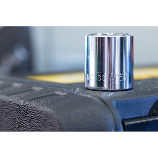 STANLEY STMT82832-1 chrome 30mm socket tool closeup on textured surface.
