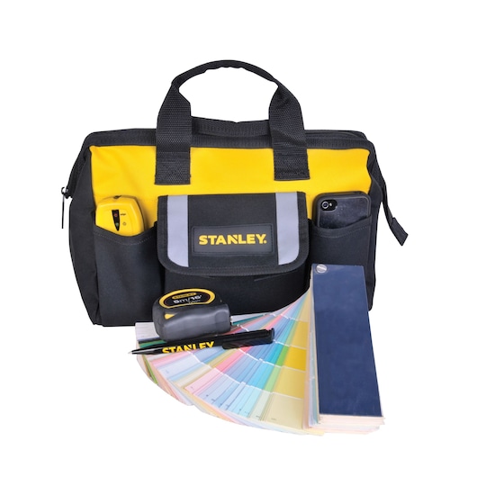 STANLEY STST512114 yellow and black tool bag with handles, tape measure, marker, and color swatches, front angle.