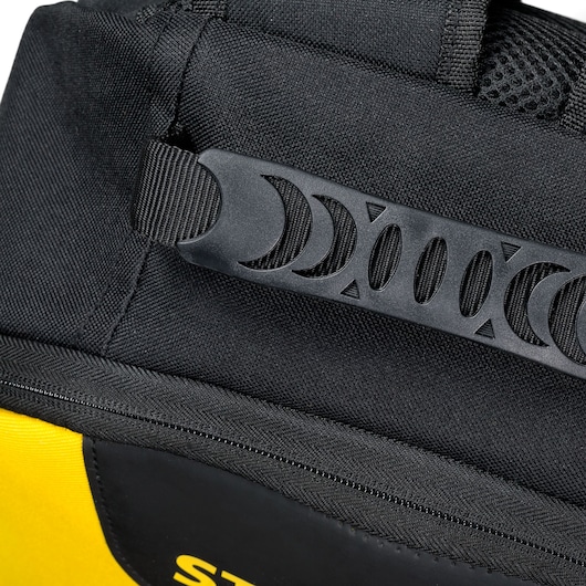 STANLEY STST515155 tool bag close-up showing black handle with cutout design and yellow fabric detail, top angle.