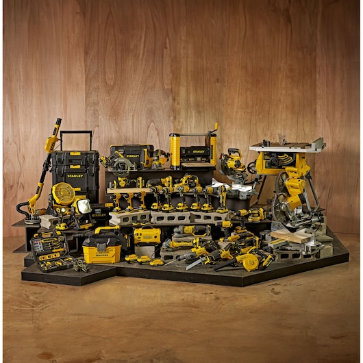 STANLEY SB202 photography of assorted yellow and black power tools, toolboxes, and workshop equipment on display.